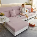 Pale pink stretch sofa cover set with jacquard texture and matching cushion in living room - Light Pink