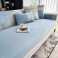 Modern light blue ice silk sofa cover with non-slip texture and floral borders - 70*70cm / Blue