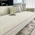 Ice silk cooling sofa mat in beige herringbone pattern with blue geometric border - 70*70cm / Off-white