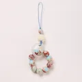 Ethnic Shoushan stone phone charm with blue patterned beads and carved lion pendant - Shoushan Stone Awakening Lion