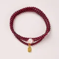Three-wrap garnet beaded bracelet with white pearl and golden Fu charm pendant - Freshwater Pearl & Fu Blessing Tag Style / 3mm Bead Diameter / Triple-Wrap / Burgundy