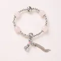 Pink crystal beaded bracelet with silver fortune charm pendants and metallic tassels - Rose Quartz Lucky Bag Bracelet