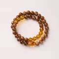 Διπλό βραχιόλι με χάντρες Kuka, κεχριμπαρένιο κεντρικό στοιχείο και καφέ vintage χάντρες - Κεχριμπάρι (Άνθος Κεχριμπαριού)