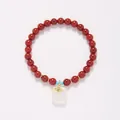 Elegant Red Agate Beaded Bracelet with Golden Accents and a White Jade Charm - 6MM Red Agate with Chalcedony Tag
