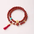 Double-wrap red agate bead bracelet with tassel, gold coin charm, and turquoise accent - 6MM Red Agate Double Loop Money Bag Tassel