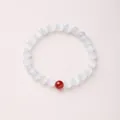Minimalist cat eye stone bracelet with white translucent beads and a single red accent bead - White Cat's Eye Red Agate (8mm)