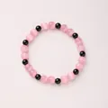 Elegant cat eye stone bracelet with pink beads and black accents in a minimalist style - Pink Cat's Eye Black Agate (8mm)