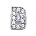 Close-up of sparkling silver letter B shoe charm accessory set with clear rhinestones - Letter B