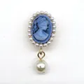 Detail of vintage cameo shoe charm with blue base, pearl border, and teardrop pearl - Blue Cameo Maiden Style