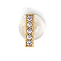 Golden rectangular metal shoe charm with five inlaid sparkling crystals on white base - Letter I