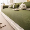 Deep green chenille sofa cover with striped texture and white lace trim with pompoms - Green