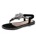 Flat black flip-flop sandals with rhinestone flowers and elastic back strap on white background - EU 36 / Black