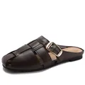 Women's dark brown woven flat mules with closed round toe and gold buckle detail - EU 36 / Coffee