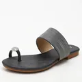 Flat black sandals with silver metallic straps and sparkling rhinestone toe ring detail - 36 / Black