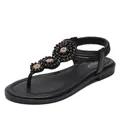 Women black bohemian flat sandals with floral beading and elastic strap for beach vacations - EU 36 / Black