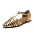 Women's gold woven flat Roman sandals with a retro closed toe and T-strap buckle closure - Gold