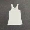 Detalle de la camiseta blanca de algodón acanalado con cuello en U y textura suave - EU 38 / Blanco
