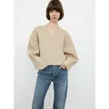 Maglione minimalista beige con scollo a V in lana con vestibilità oversize e spalle basse - XS / Color Tè al Latte