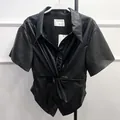 Fitted black short sleeve faux leather shirt with knot V-neck and button-down front - S / Black