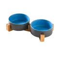 Modern double ceramic cat bowl with dark grey exterior and blue interior on wood stand - Two Small Gray Blue Bowls And Long Wood Stand