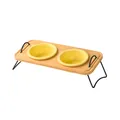 Bamboo pet feeding station with dual yellow ceramic bowls and black metal handles - Matte Creamy Yellow Bowls with Double Hole Bamboo Board and Metal Stand