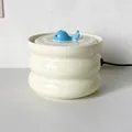 Ceramic pet water fountain with blue whale pump and rippled white body design - Off White