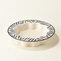 Ceramic pet bowl with wavy edges and black zebra pattern on a cream finish - Matte Tiger
