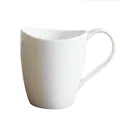 Minimalist white ceramic mug with unique wavy rim and curved handle for coffee - 430ml Smile Mug