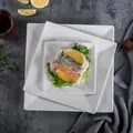 Minimalist white square ceramic dinner plate set in three sizes on stone table - Large