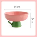 Pink tulip-shaped ceramic elevated pet bowl with green leaf handle and 14cm wide rim - Pink