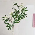 Artificial white flower branch with green leaves and yellow stamens for home decor - White