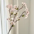 Branche de cerisier artificiel en dégradé rose clair avec des feuilles vertes réalistes - Blanc Rose