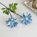 Elegant grey-blue dahlia artificial flowers with green leaves and a vintage frame - Blue
