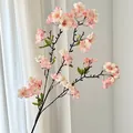 Artificial cherry blossom branch in soft pink and white gradient with green leaves - Champagne Pink
