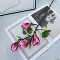 Single spray of pink purple faux magnolia flower with realistic texture and wood stem - Purple