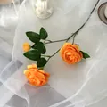 Three-headed artificial Persian buttercup in orange with lush green leaves and silk petals - Single Stem Multiple Heads / Orange