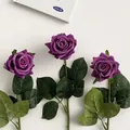 Three premium purple faux roses with realistic silk texture on a clean white background - Purple