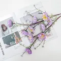 Detailed view of purple faux poppy flowers with yellow stamens for home decoration - Purple