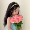 Pale yellow child headband with pearl accent and smooth matte finish on young girl - Light Pink