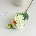 Single white silk peony stem with orange stamens and green bud in a ceramic vase - White