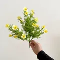 Artificial yellow babys breath flower bouquet with green foliage and white accents - Yellow