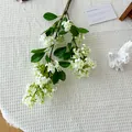 Lifelike artificial white lilac stem with dense small flower clusters and green leaves - White