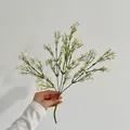 Artificial white baby's breath bouquet with green stems for home and wedding decor - White