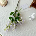 Single spray of lifelike light purple lilac with green leaves on white textured fabric - Light Purple