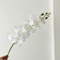 Lifelike white artificial Phalaenopsis orchid branch with delicate buds and yellow spots - White