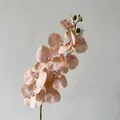 Single stem artificial orchid with nine realistic apricot pink petals and green buds - Wheat