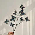 Faux butterfly branch with 8 blue and orange insects for Monet garden decor - Spotted Blue