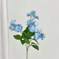 Kunstmatige blauwe madeliefjes met kleurverloop en groene bladeren voor decor - Blauw
