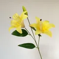 Artificial lily branch with two blooming yellow heads and a green bud for home decor - Yellow