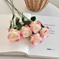 Artificial rose bouquet with five pink-white gradient silk flowers on a vintage book - Rose Pink Edge